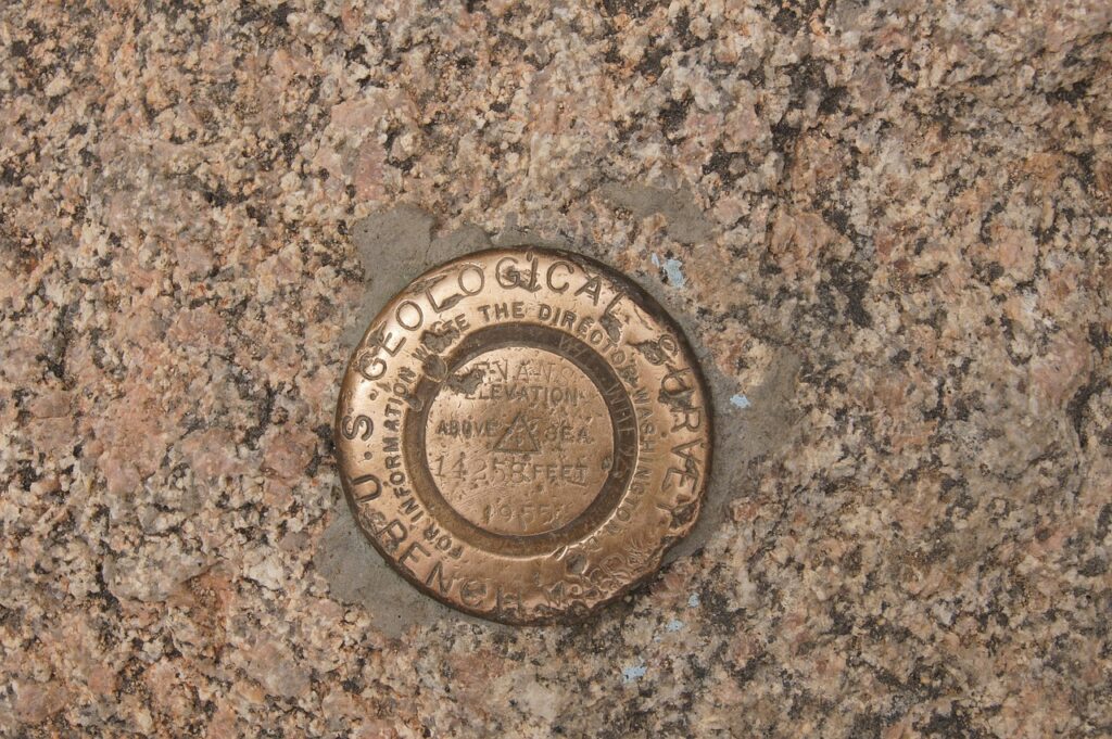 geo marker, nature, mountain top, geo-caching, brown, tan, mountain, summit marker, rocky mountains, continental divide, the rockies