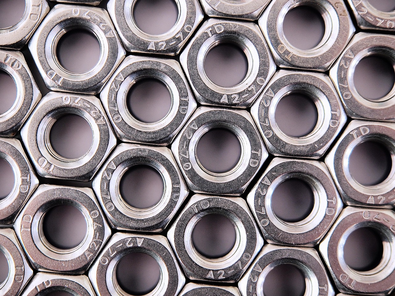 nut, hex, hexagon, attach, close, packed, hexagonal, array, pattern, many, crazy, mad, bonkers, engineering, mechanical, screw, thread, fasten, steel, metal, metallic, industrial, construction, hardware, industry, fastener, shiny, stainless, chrome, technology, connection, connect, repeat, geometric, grid, lattice, design, geometry