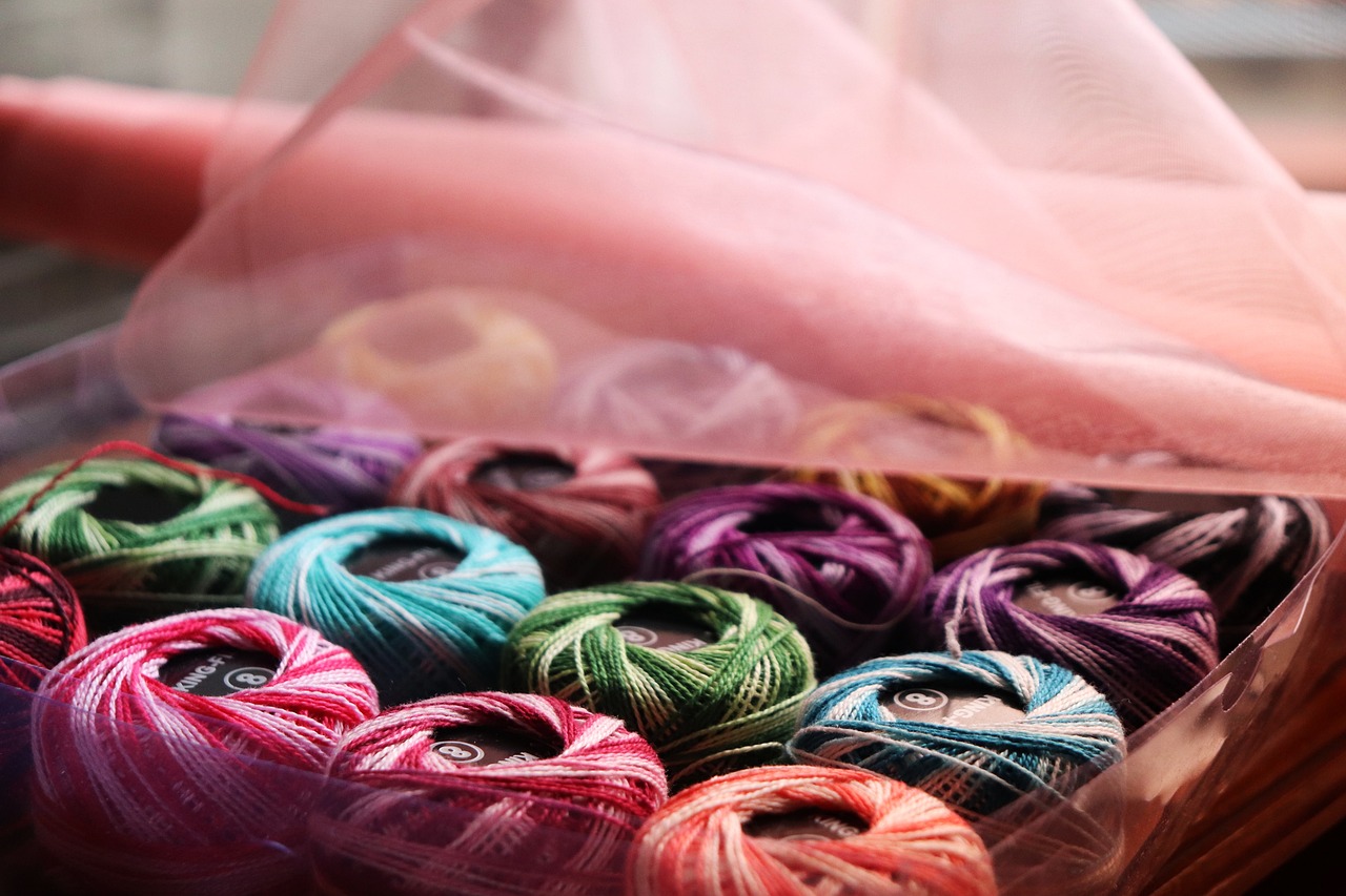 embroidery thread, colorful yarn, crochet, knitting, craft supplies, needlework, textile art, vibrant colors, yarn balls, sewing, embroidery, thread spools, hobby, diy crafts, home crafts, textile threads, fiber arts, colorful threads, yarn closeup, craft materials, wool, cotton thread, multicolor yarn, thread, colorful
